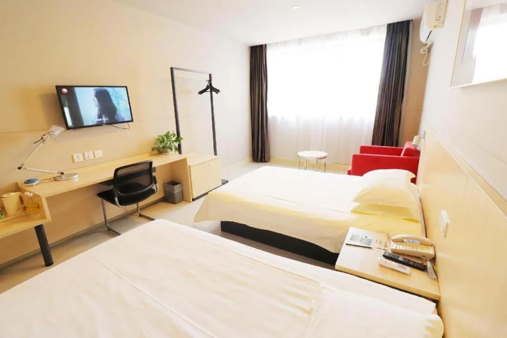 Bed in Jinjiang Inn Shanghai Minhang Zhuanqiao