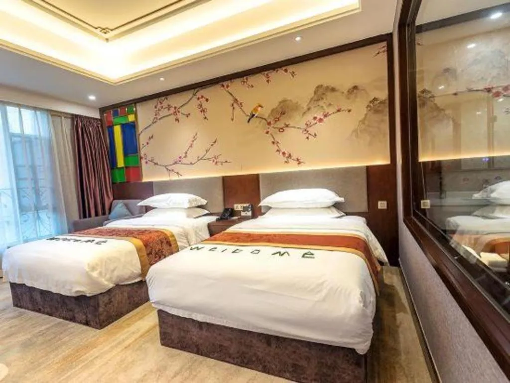 Bed in Nan Guo Hotel