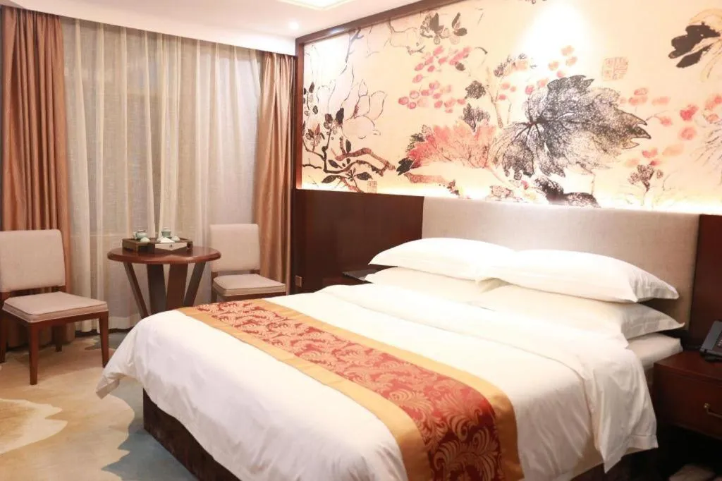 Bed in Nan Guo Hotel