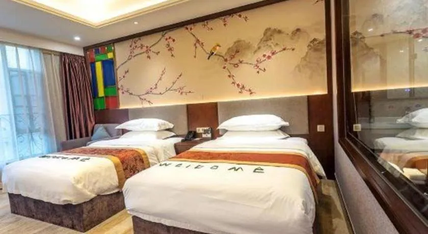 Bed in Nan Guo Hotel