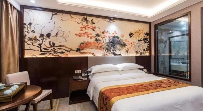 Bed in Nan Guo Hotel