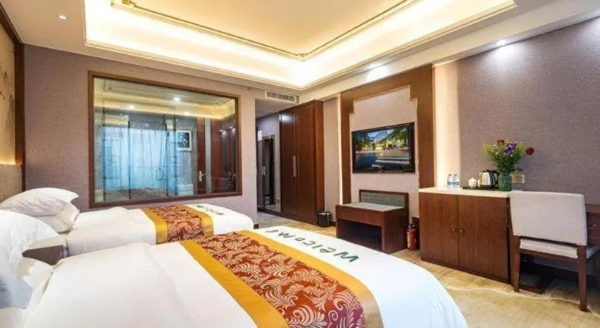 Bed in Nan Guo Hotel