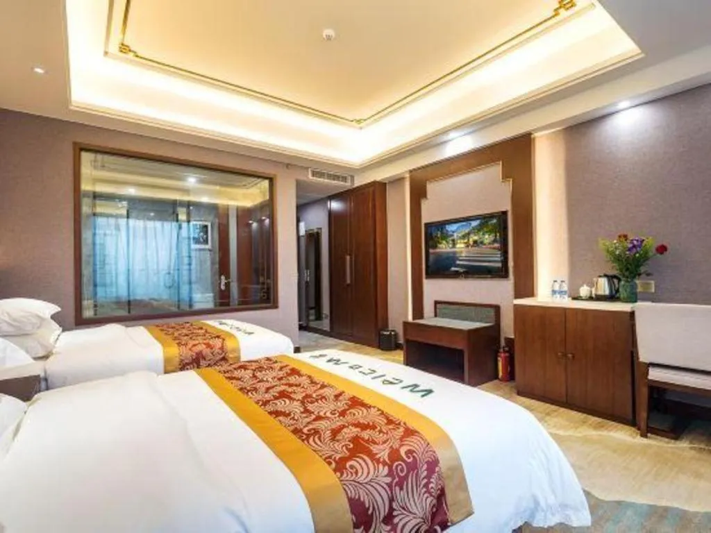 Bed in Nan Guo Hotel