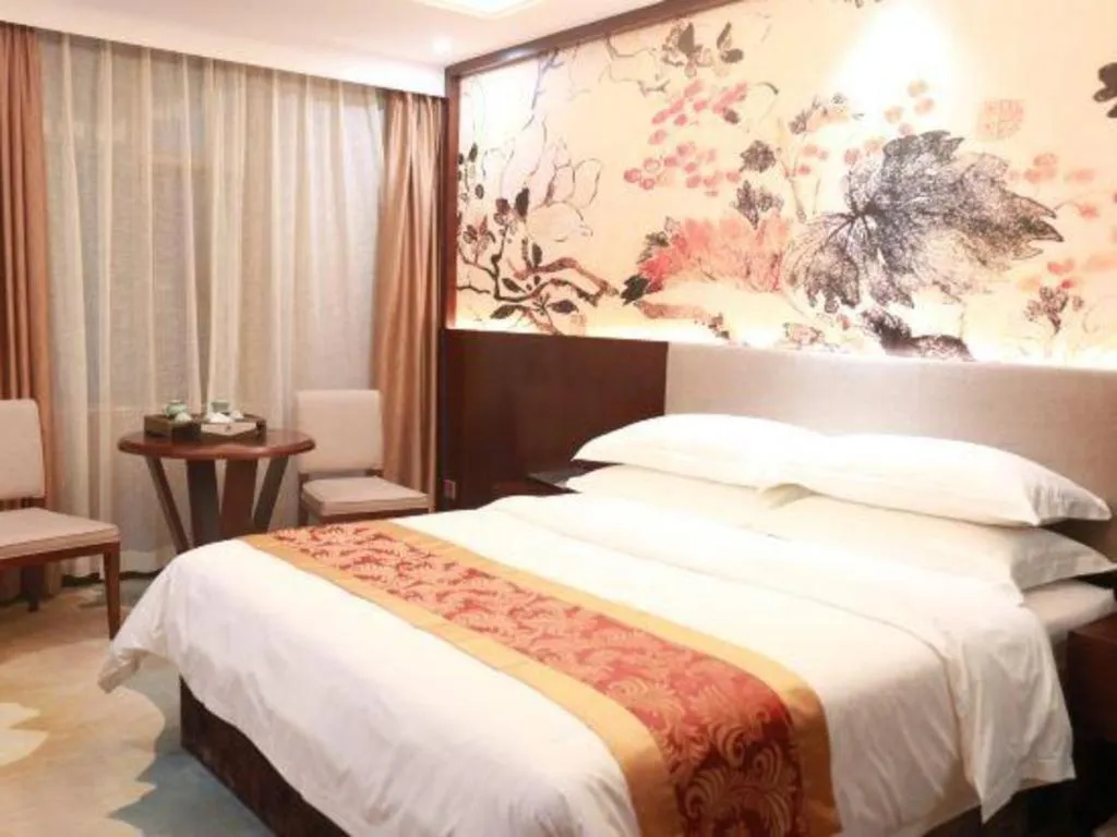 Bed in Nan Guo Hotel