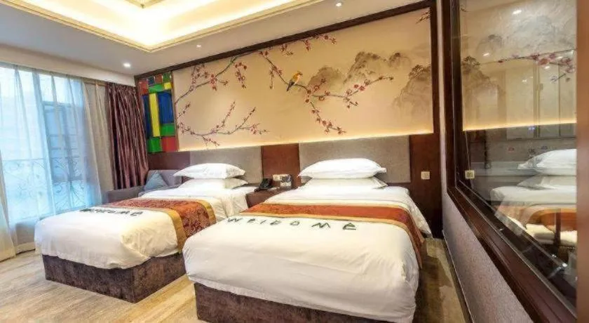 Bed in Nan Guo Hotel