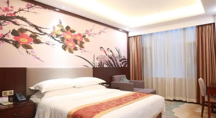 Bed in Nan Guo Hotel