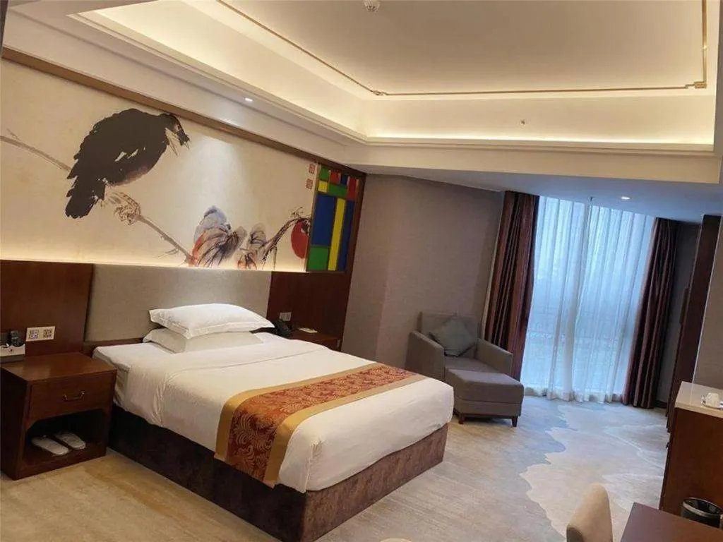 Bed in Nan Guo Hotel