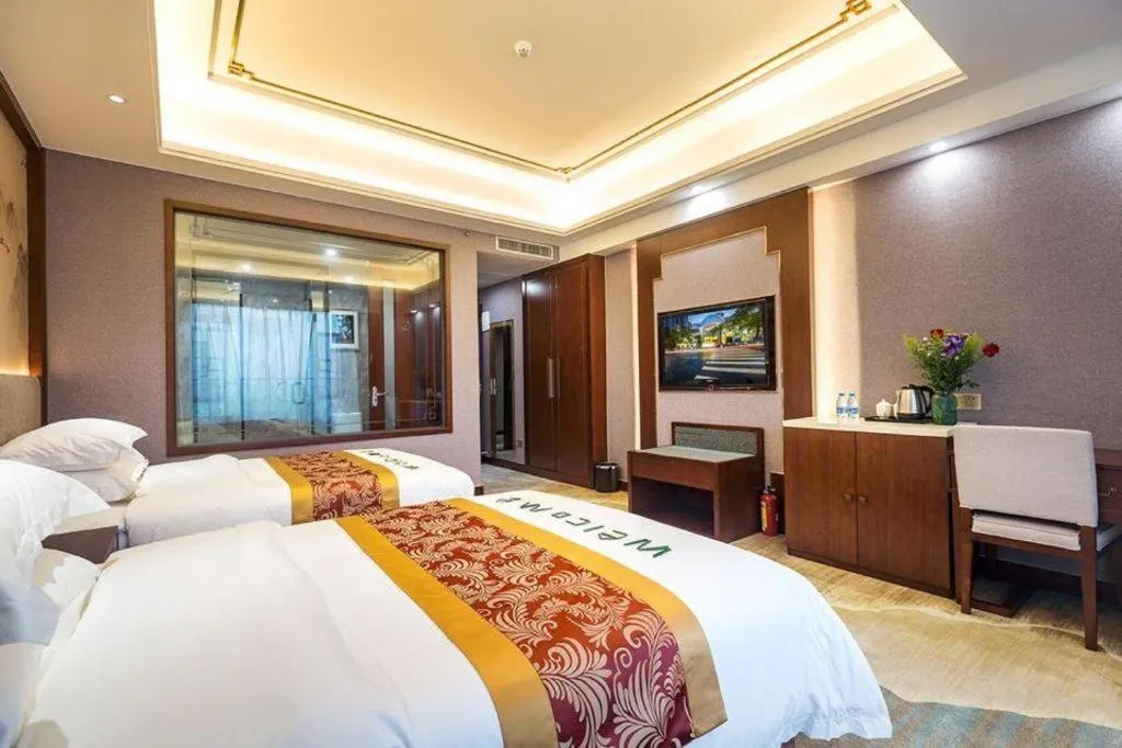 Bed in Nan Guo Hotel