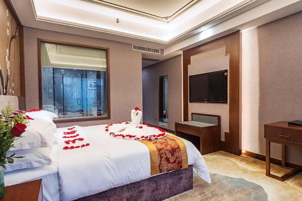 Bed in Nan Guo Hotel