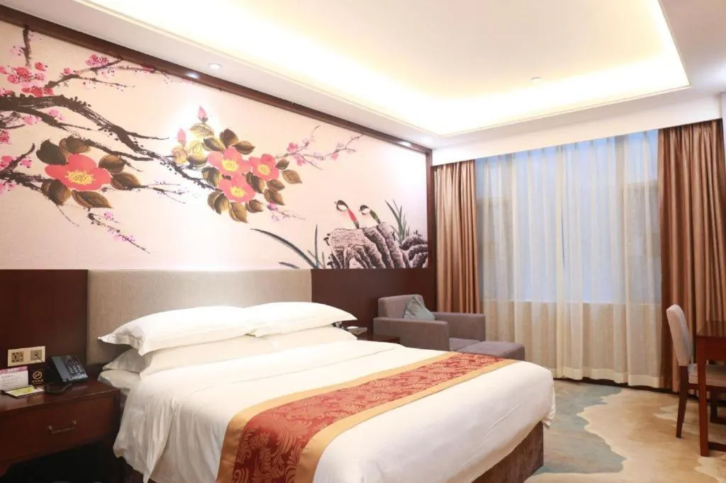 Bed in Nan Guo Hotel