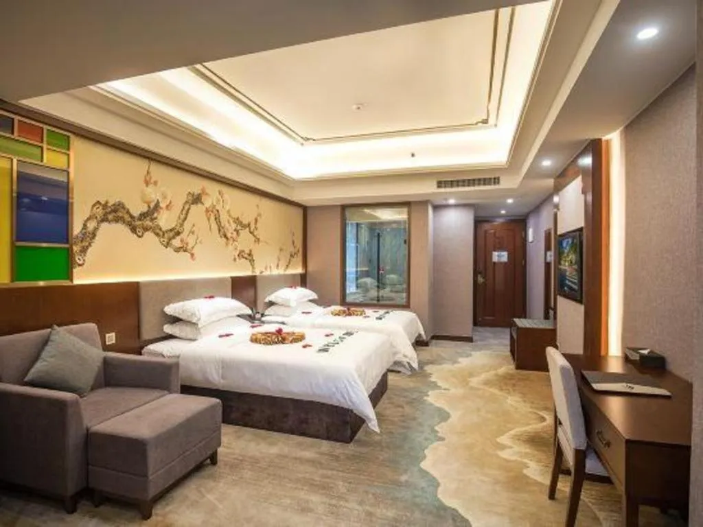 Bed in Nan Guo Hotel