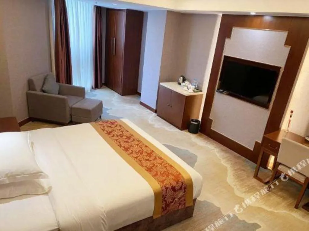 Bed in Nan Guo Hotel