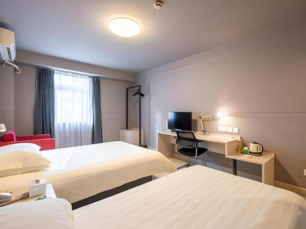 Bed in Magnotel Classic Shenyang General Hospital of Northern Theater Command