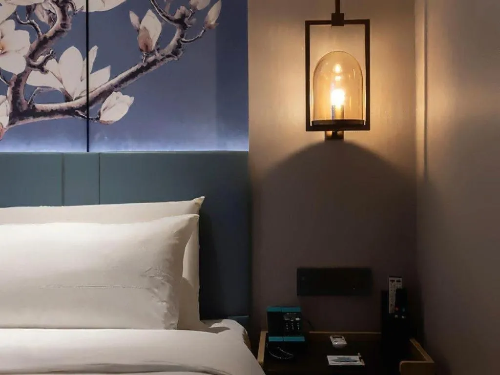 Bed in Magnotel Classic Shenyang General Hospital of Northern Theater Command