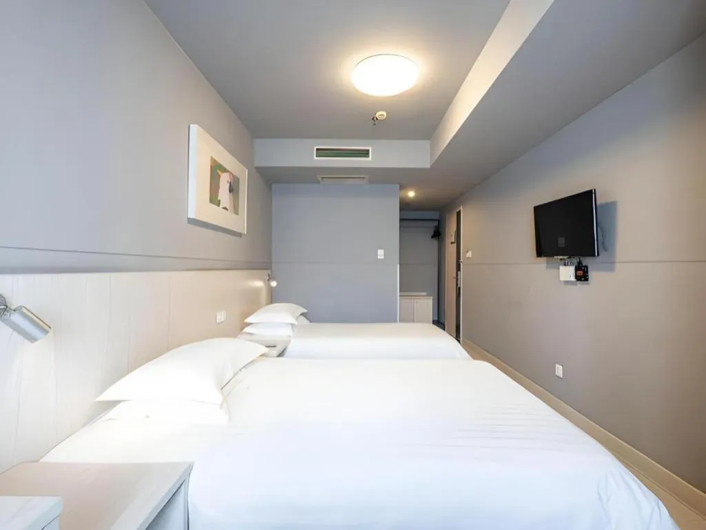 Bed in Magnotel Classic Shenyang General Hospital of Northern Theater Command