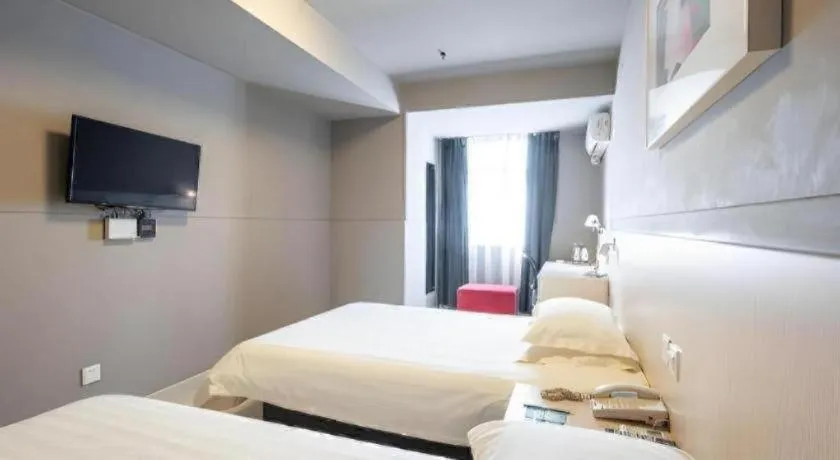 Bed in Magnotel Classic Shenyang General Hospital of Northern Theater Command