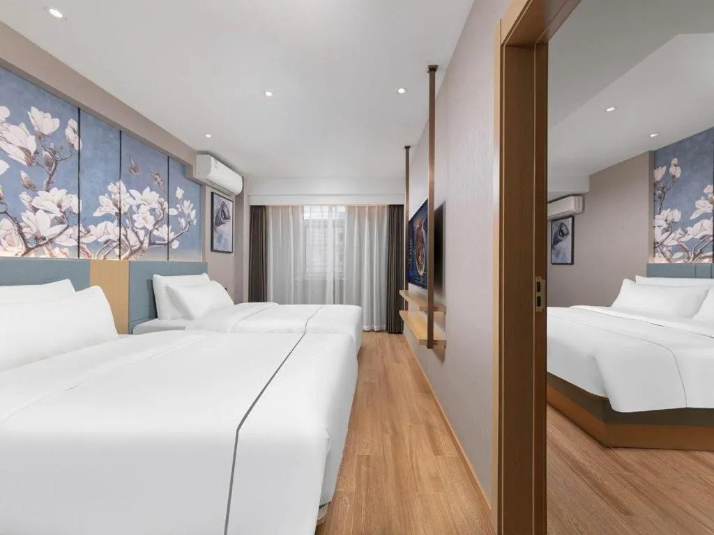 Bed in Magnotel Classic Shenyang General Hospital of Northern Theater Command