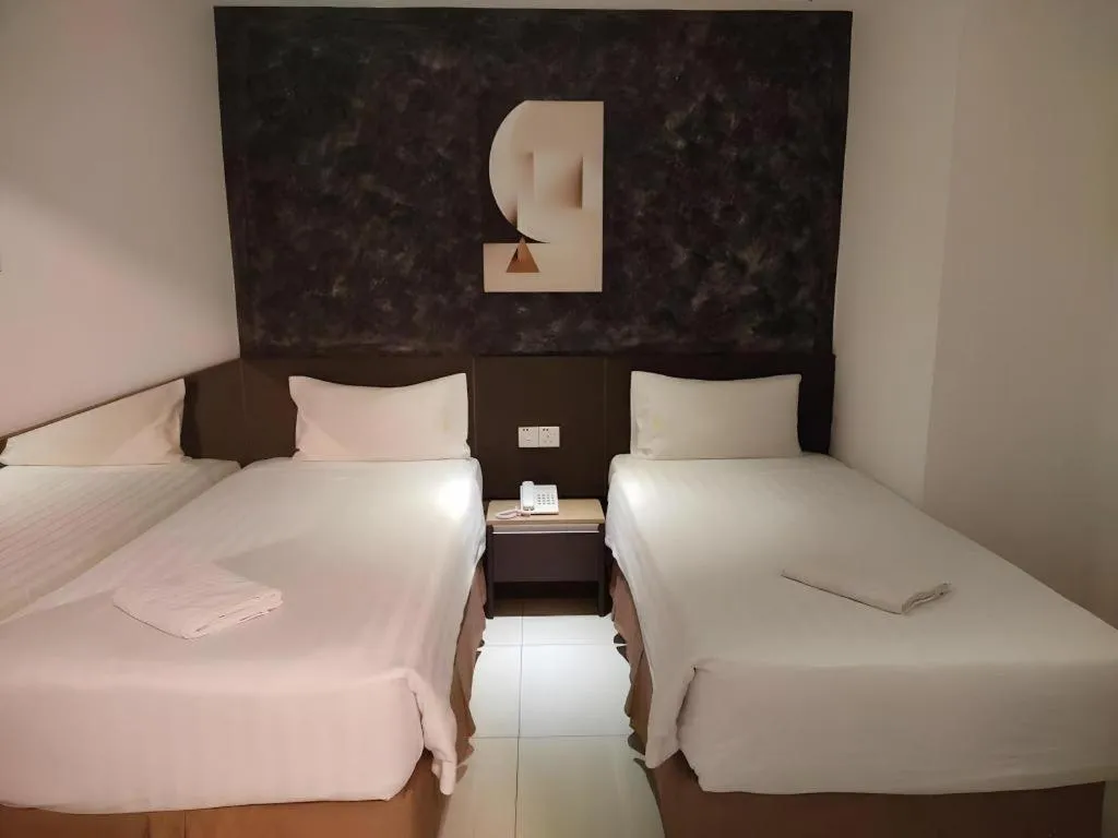 Bed in Jin Hotel