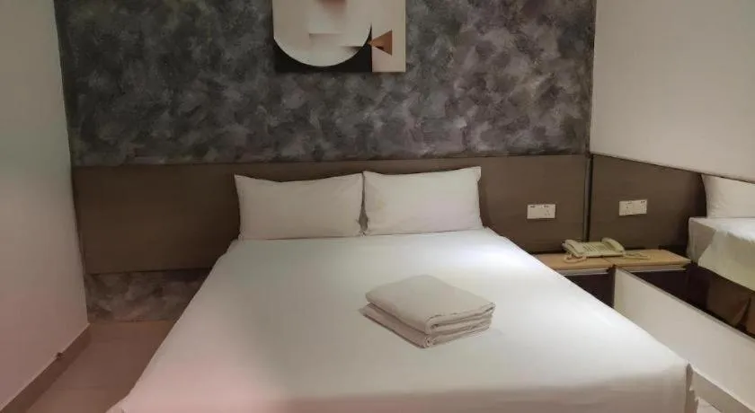 Bed in Jin Hotel