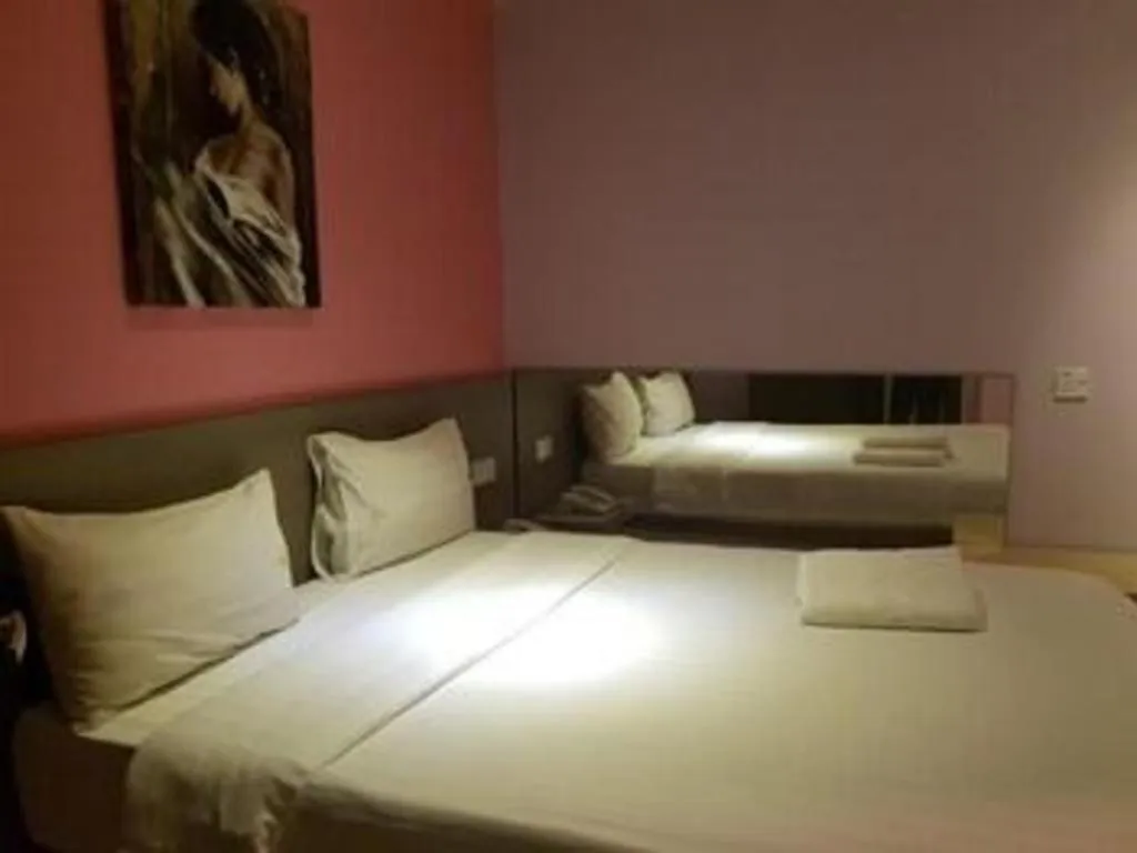 Bed in Jin Hotel