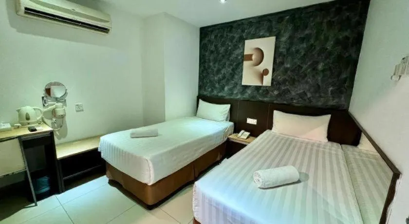 Bed in Jin Hotel