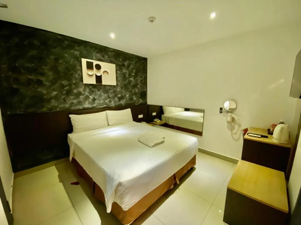 Bed in Jin Hotel