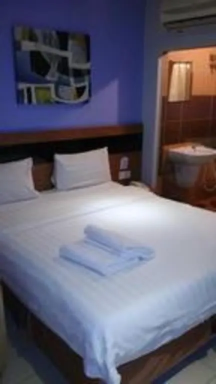 Bed in Jin Hotel