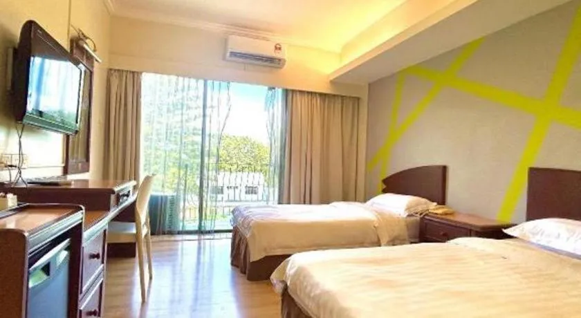 Bed in Casuarina Hotel
