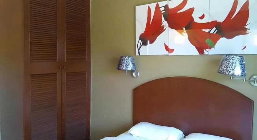 Bed in Casuarina Hotel