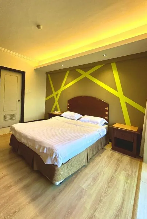 Bed in Casuarina Hotel