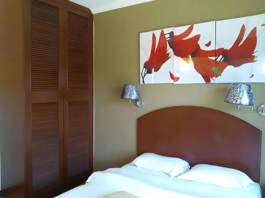 Bed in Casuarina Hotel Bed in Casuarina Hotel