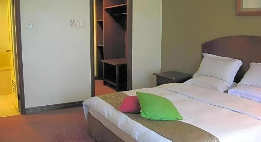 Bed in Casuarina Hotel