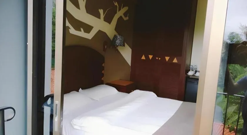 Bed in Casuarina Hotel