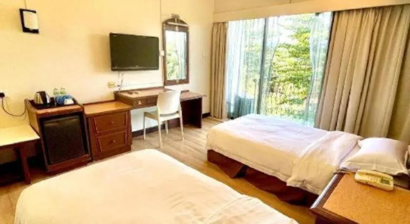 Bed in Casuarina Hotel