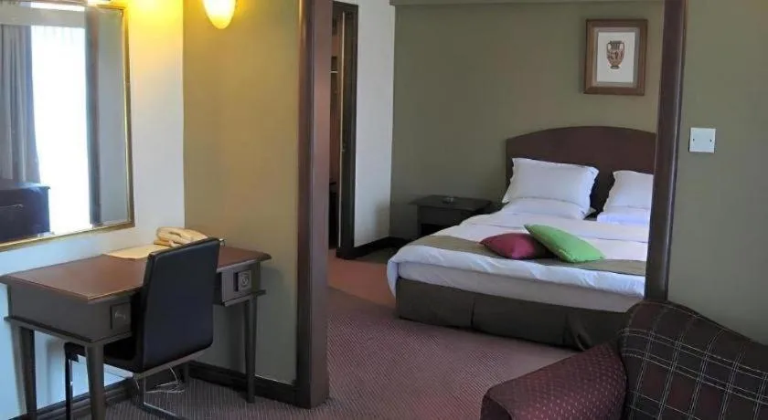 Bed in Casuarina Hotel