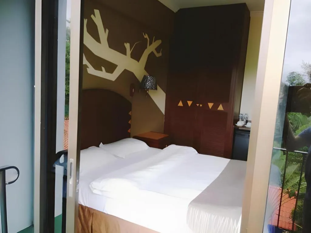 Bed in Casuarina Hotel