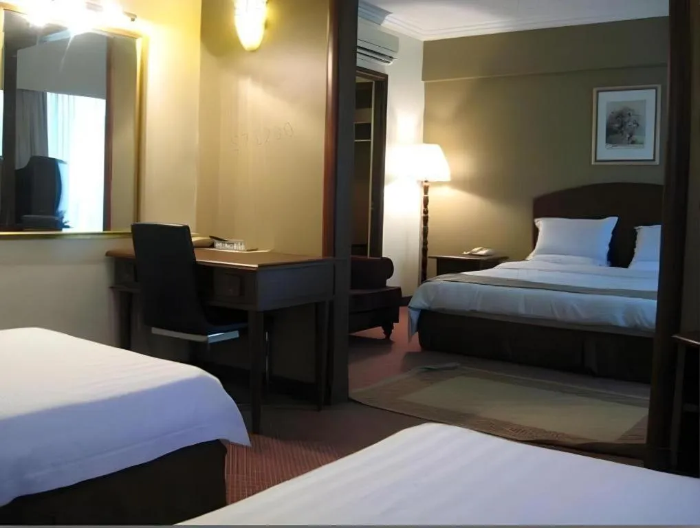 Bed in Casuarina Hotel