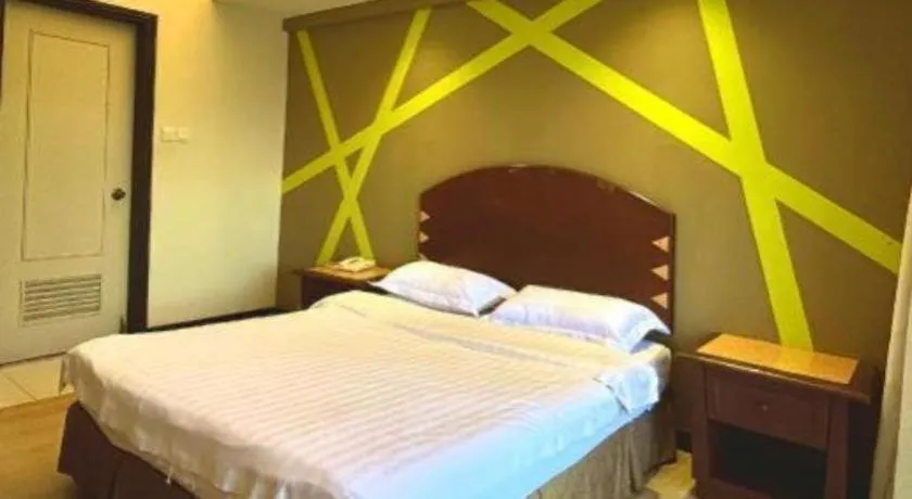 Bed in Casuarina Hotel