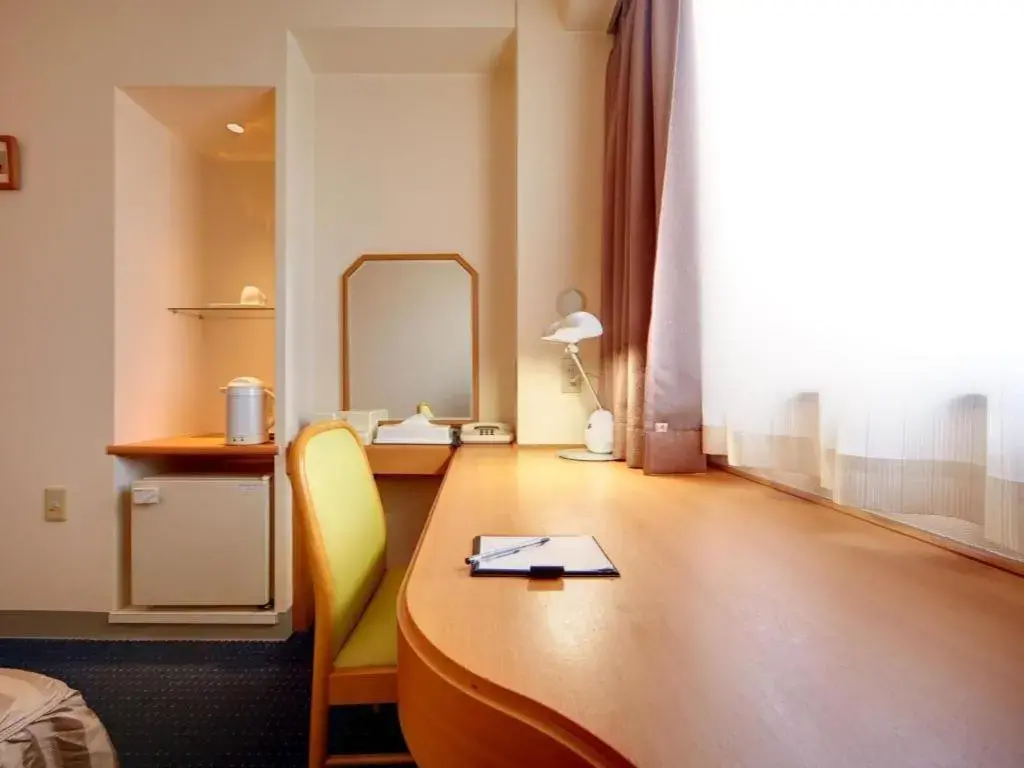 Bed in Roco Inn Matsuyama Bed in Roco Inn Matsuyama