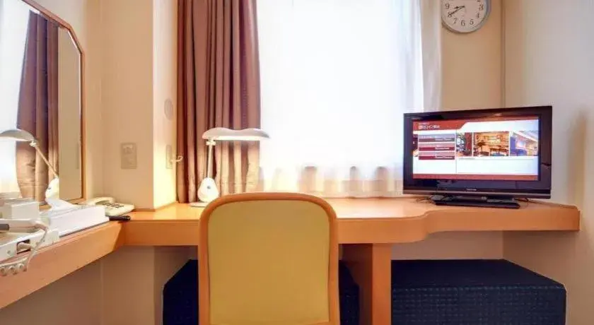 Bed in Roco Inn Matsuyama Bed in Roco Inn Matsuyama