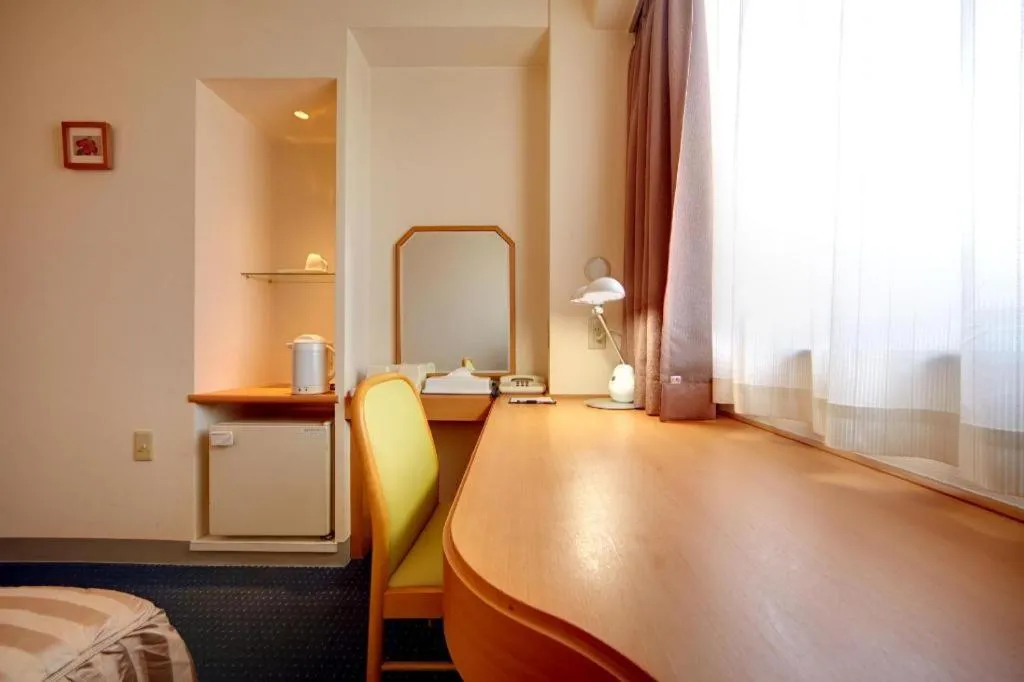 Bed in Roco Inn Matsuyama