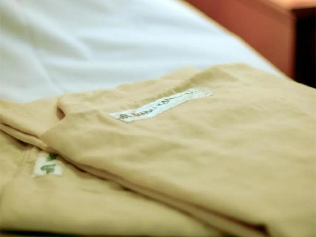 Bed in Nansei Kanko Hotel