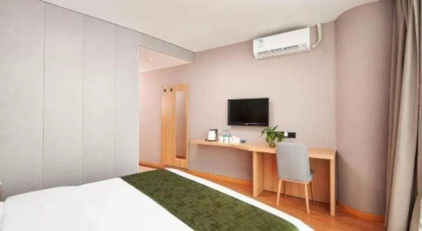 Bed in GreenTree Inn Shanghai Jiading Anting Motor City Express Hotel
