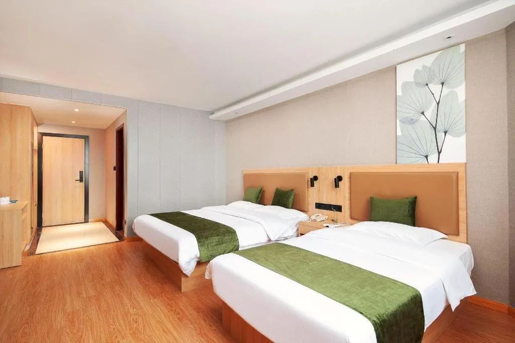 Bed in GreenTree Inn Shanghai Jiading Anting Motor City Express Hotel