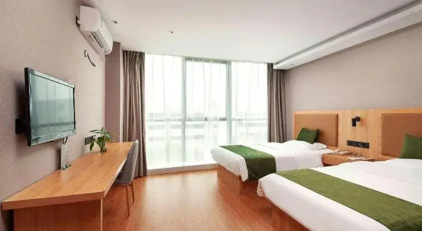 Bed in GreenTree Inn Shanghai Jiading Anting Motor City Express Hotel Bed in GreenTree Inn Shanghai Jiading Anting Motor City Express Hotel