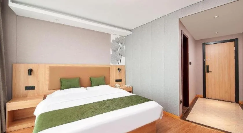 Bed in GreenTree Inn Shanghai Jiading Anting Motor City Express Hotel