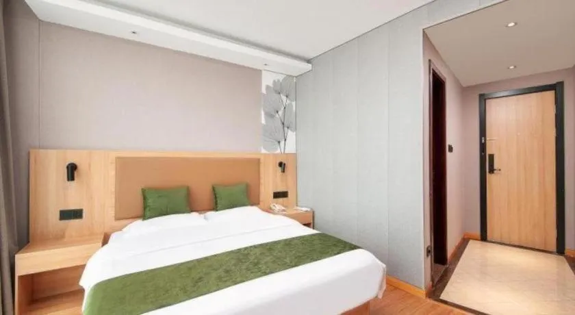 Bed in GreenTree Inn Shanghai Jiading Anting Motor City Express Hotel