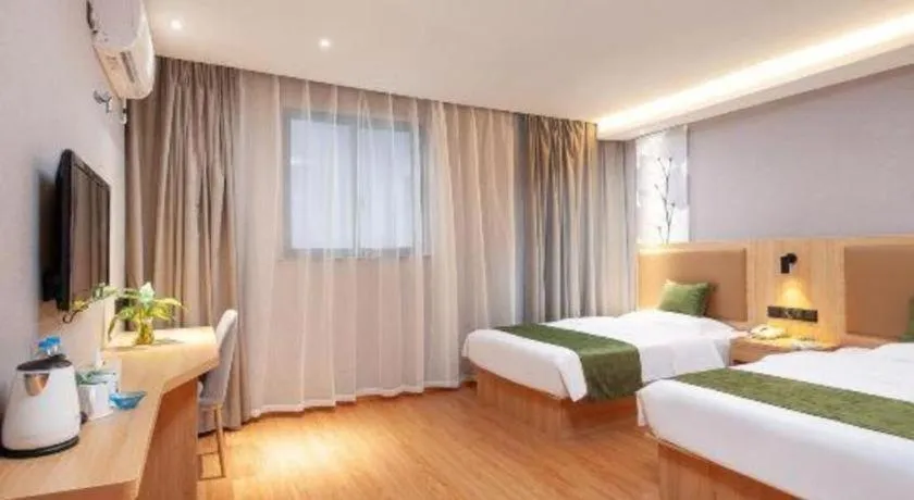 Bed in GreenTree Inn Shanghai Jiading Anting Motor City Express Hotel