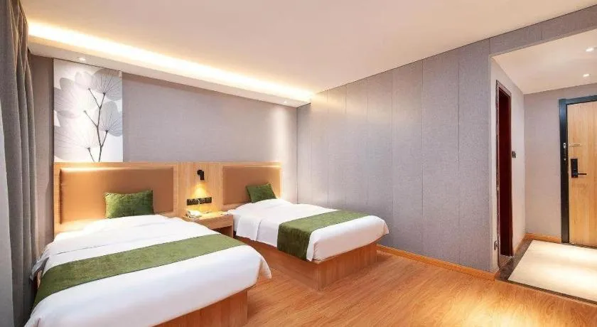 Bed in GreenTree Inn Shanghai Jiading Anting Motor City Express Hotel