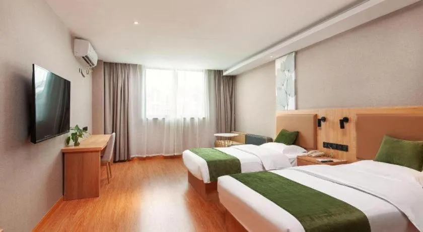 Bed in GreenTree Inn Shanghai Jiading Anting Motor City Express Hotel